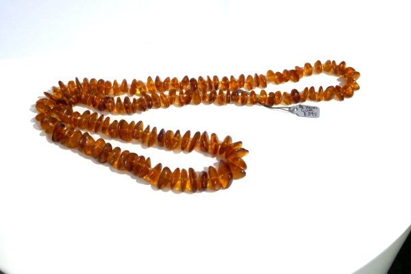 Long string of Kauri Gum beads - Image 2