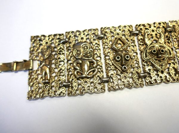 Vintage Gold coloured cuff with African and NZ figures - Image 5