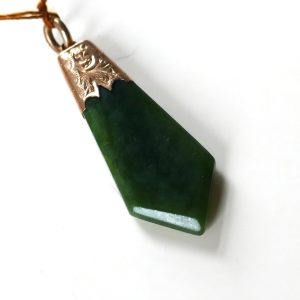 NZ Pounamu ( Greenstone ) Antique Gold Capped pendant.
